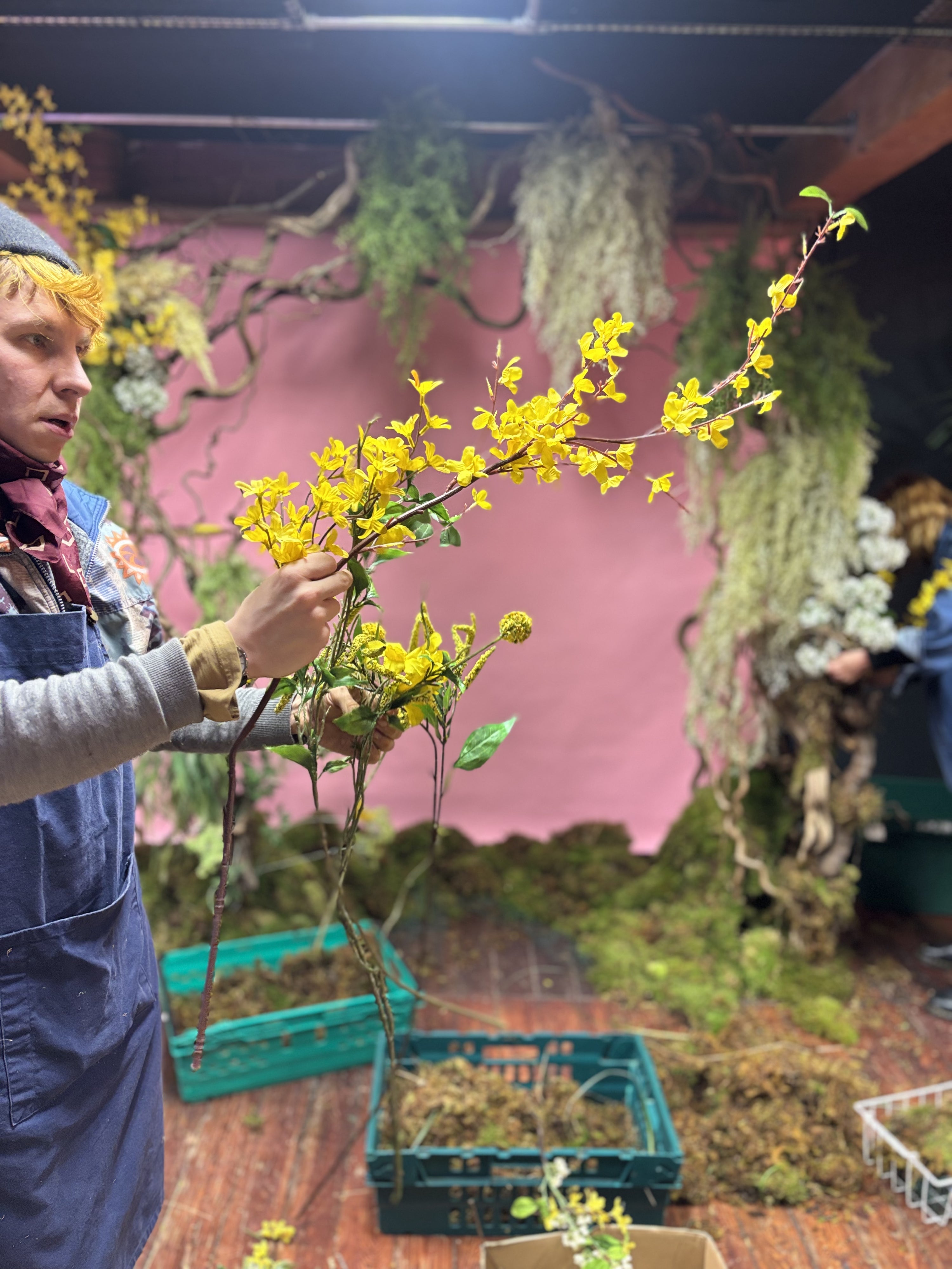 Working with fake flowers to add the drama in the installation